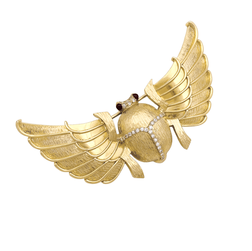 Broche "Scarabée" en or jaune, diamants et rubis.