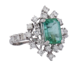 "Entourage" Ring in White Gold, Emerald, and Diamonds