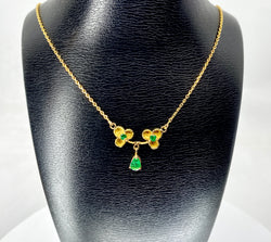 Collier pendentif en or jaune 18 carats et émeraudes