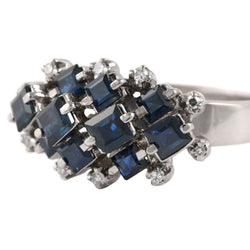 White gold ring with sapphires and diamonds
