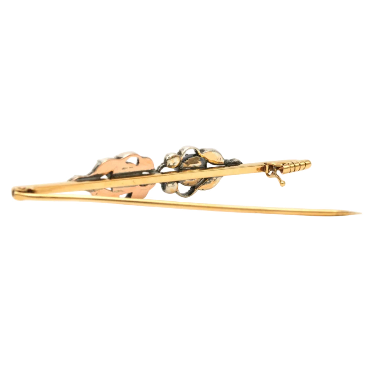 Brooch made of yellow gold, silver, and diamonds