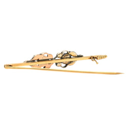 Brooch made of yellow gold, silver, and diamonds