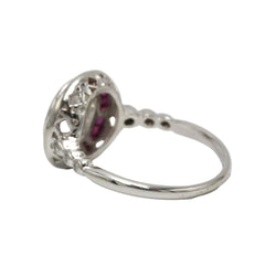Entourage Ring in platinum, rubies, and diamonds