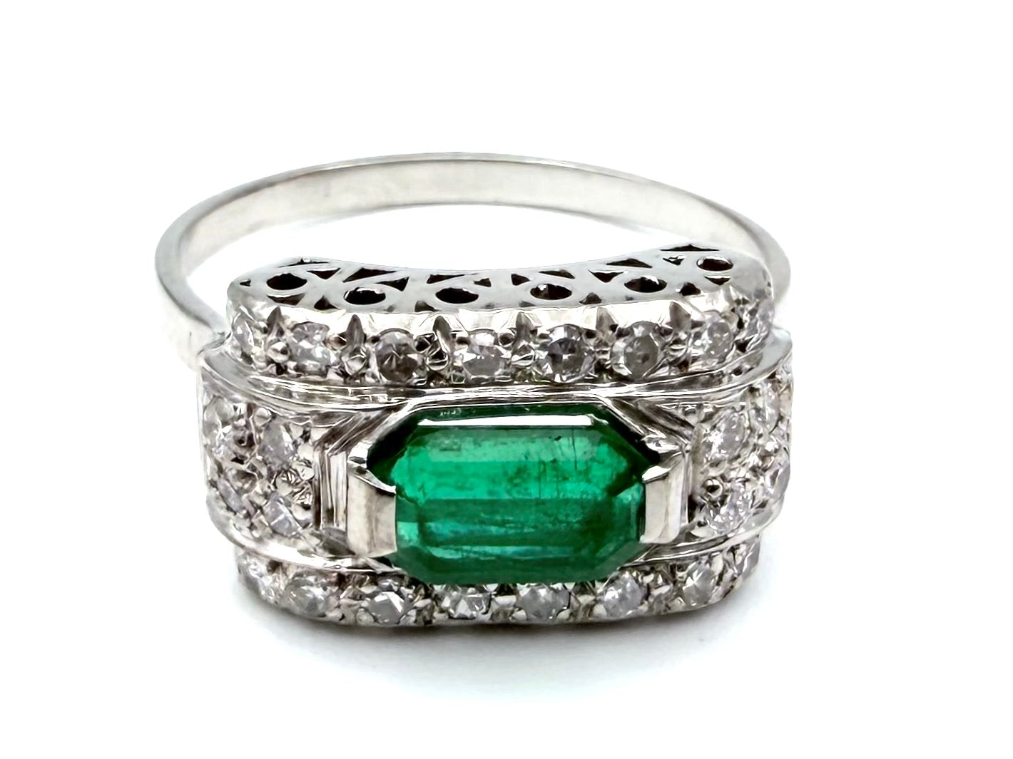 Art Deco ring in gold, platinum, emerald, and diamonds