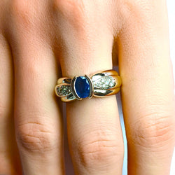 White Gold Solitaire Ring with Sapphire and Diamonds