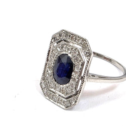 "Entourage" Ring in White Gold, Sapphire, and Diamonds