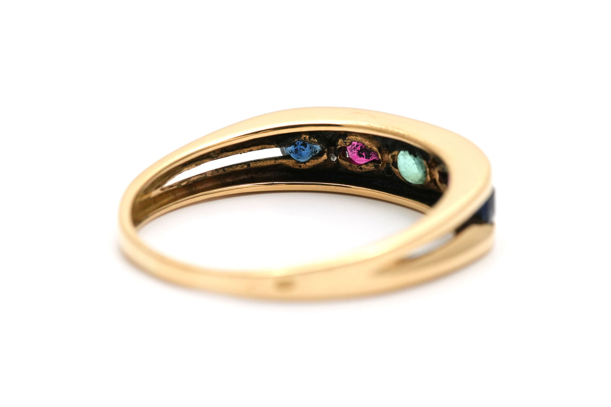 Yellow gold ring with an emerald, Ruby, Sapphires, and Diamonds