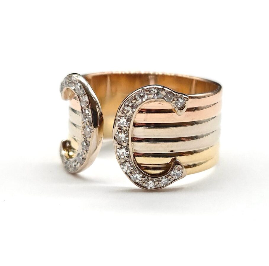 CARTIER "C de Cartier" Band Ring in white gold, yellow gold, rose gold, and diamonds