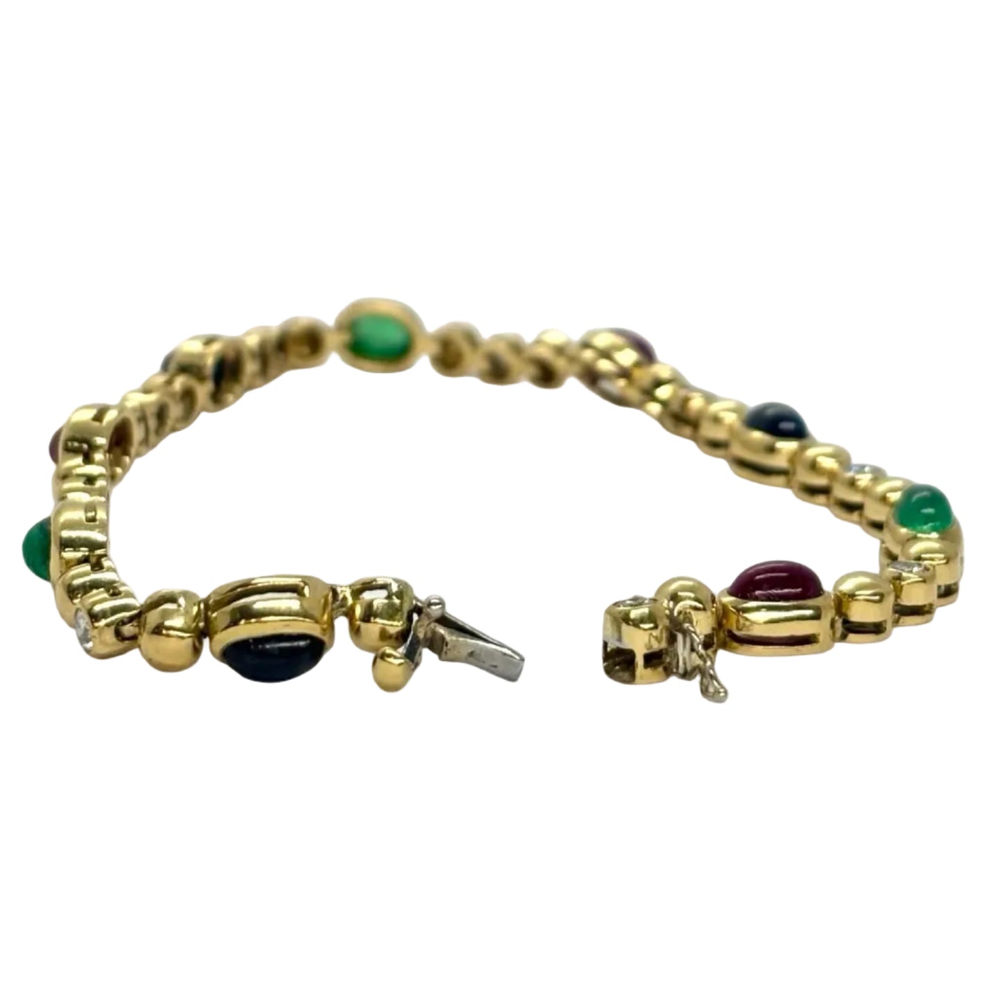 Bracelet Line in yellow gold, sapphires, emeralds, rubies and diamonds