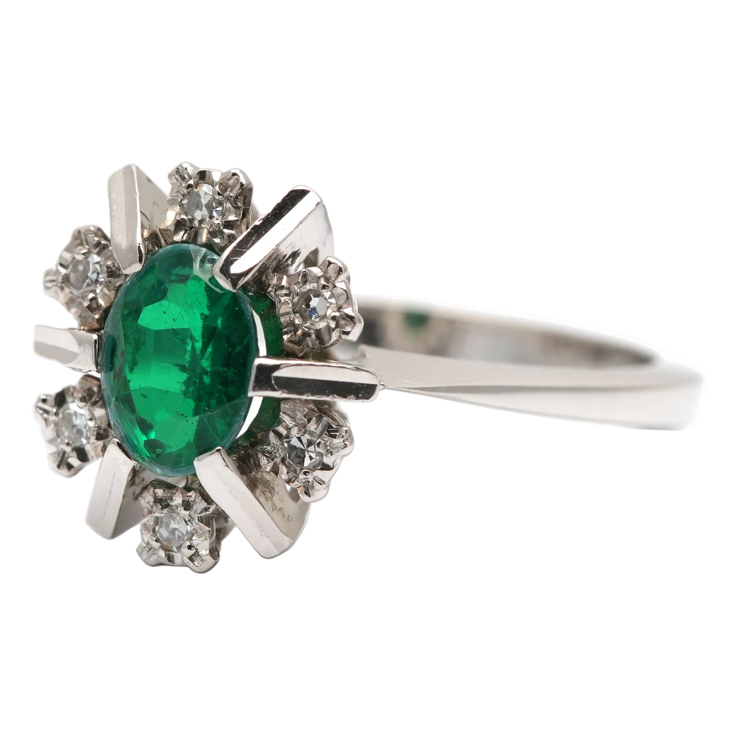 "Entourage" Ring in White Gold, Emerald, and Diamonds