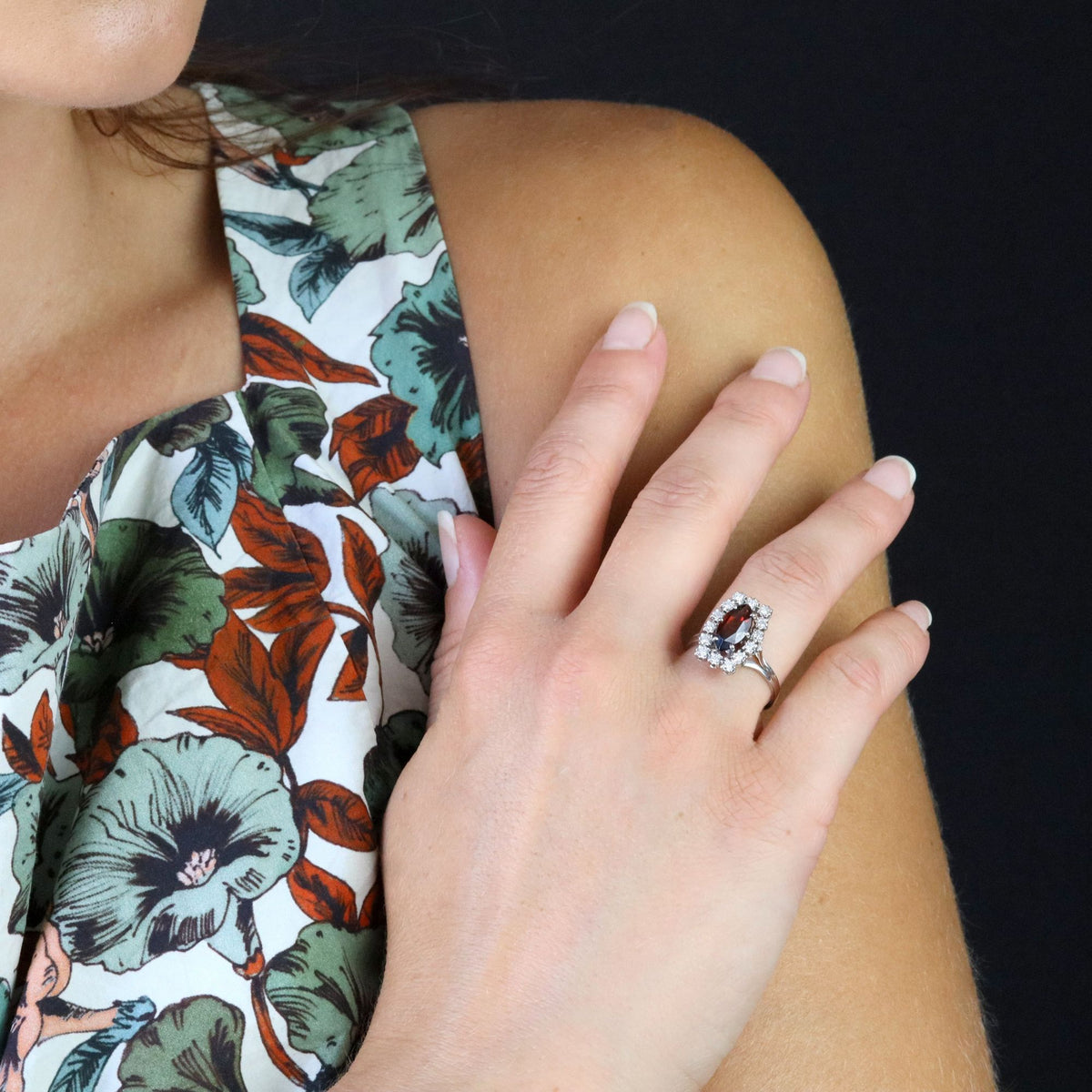 "Entourage" Ring in White Gold, Garnet, and Diamonds