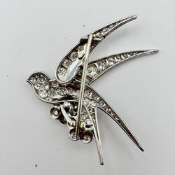 Brooch "Bird on two flowers" in white gold and Platinum
