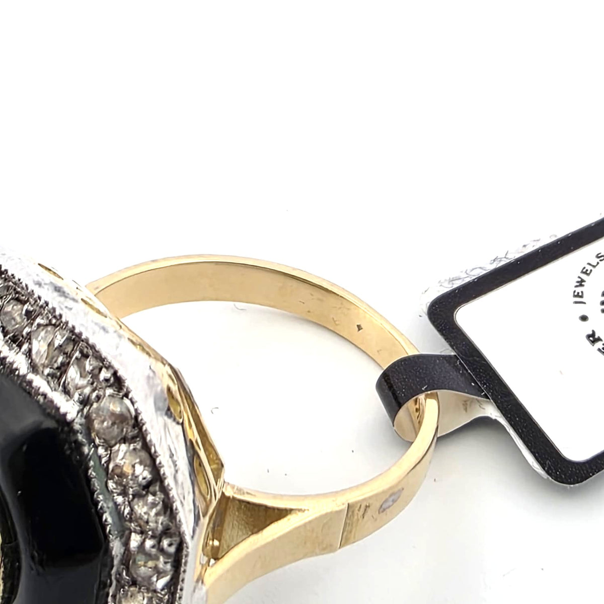 Entourage Ring in white gold, yellow gold, and diamonds