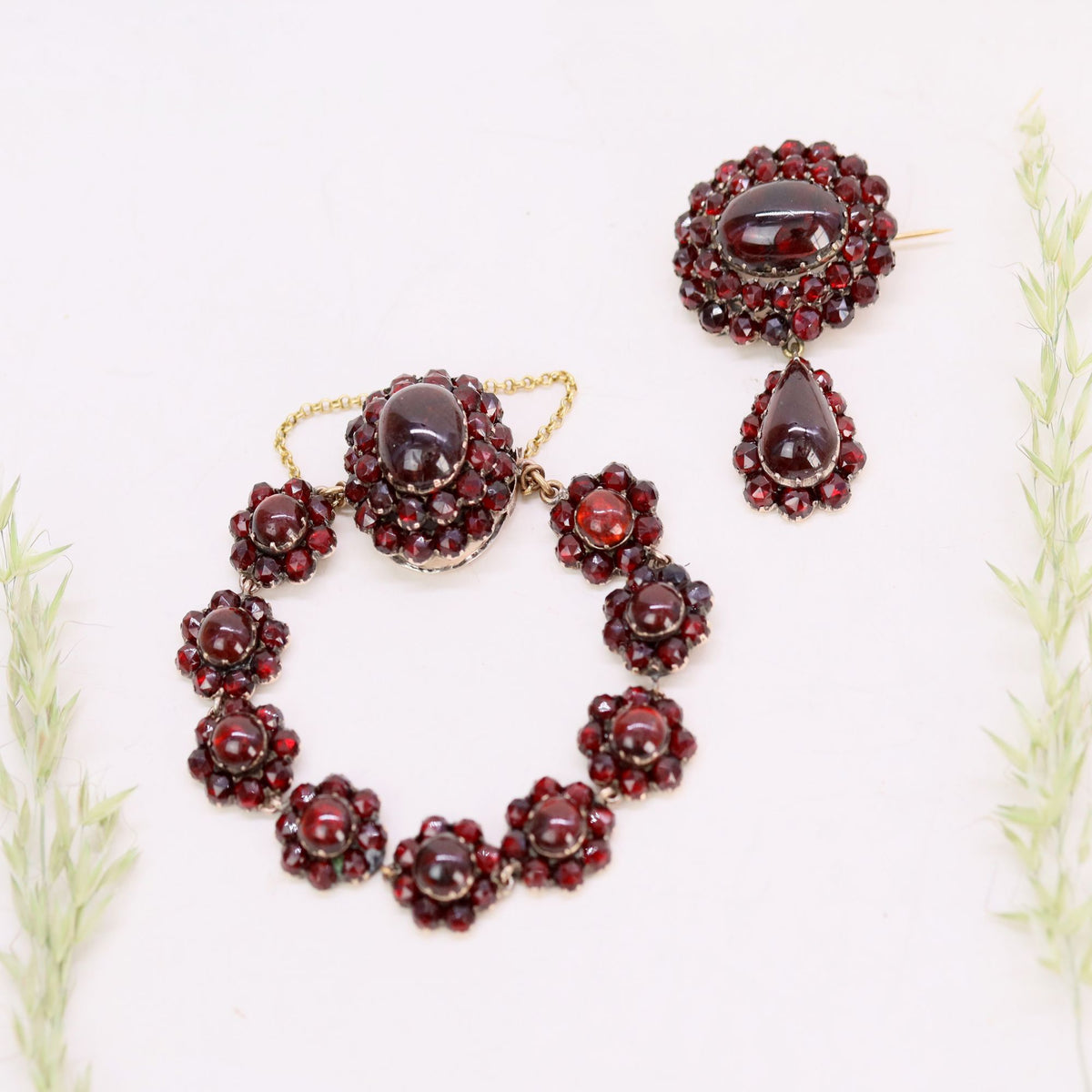 Yellow gold, silver, and garnet bracelet