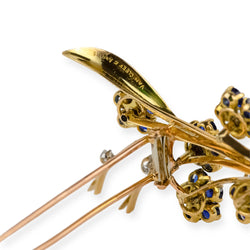 Broche Clip VAN CLEEF & ARPELS "Bouquet de fleurs" en or jaune et saphirs