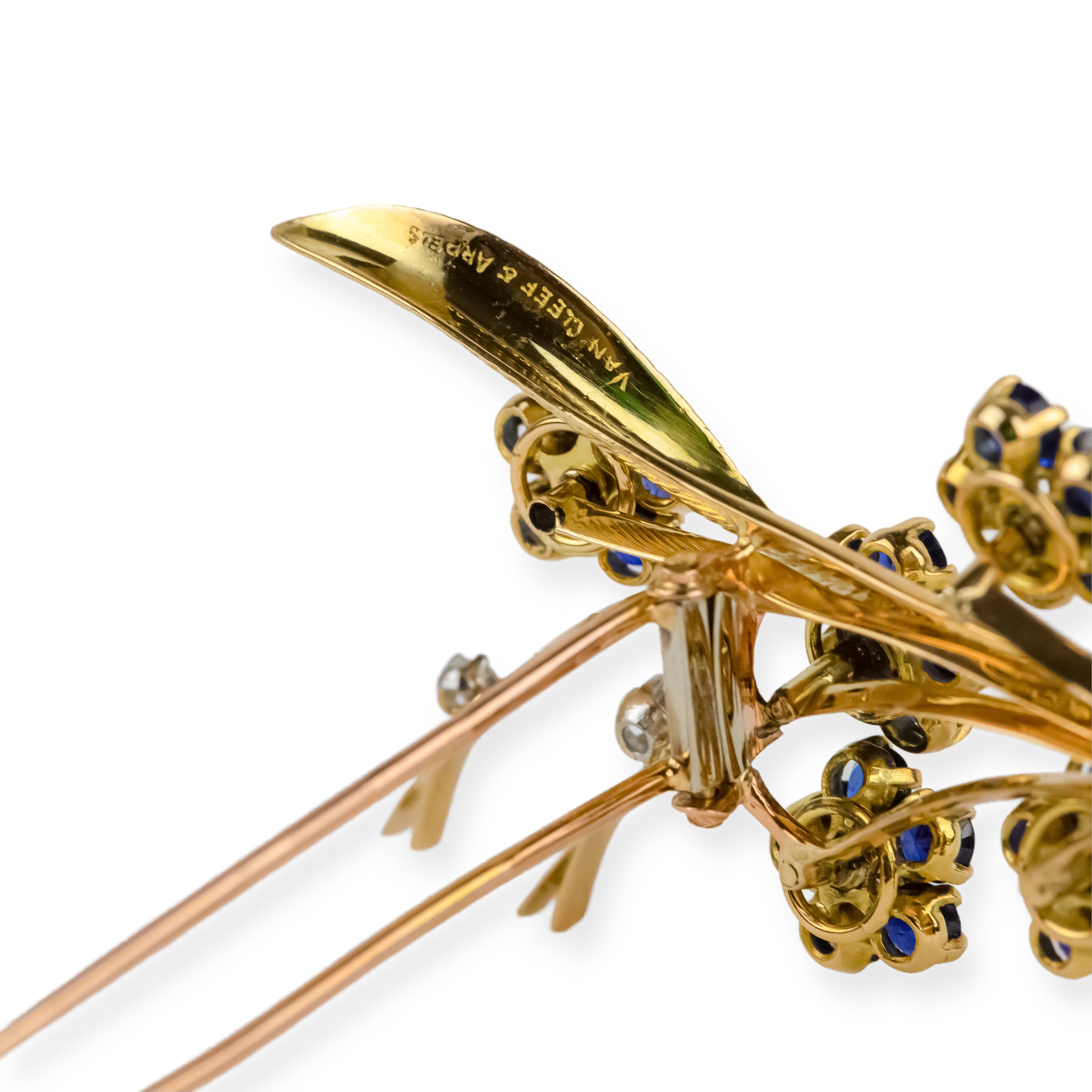 Broche Clip VAN CLEEF & ARPELS "Bouquet de fleurs" en or jaune et saphirs