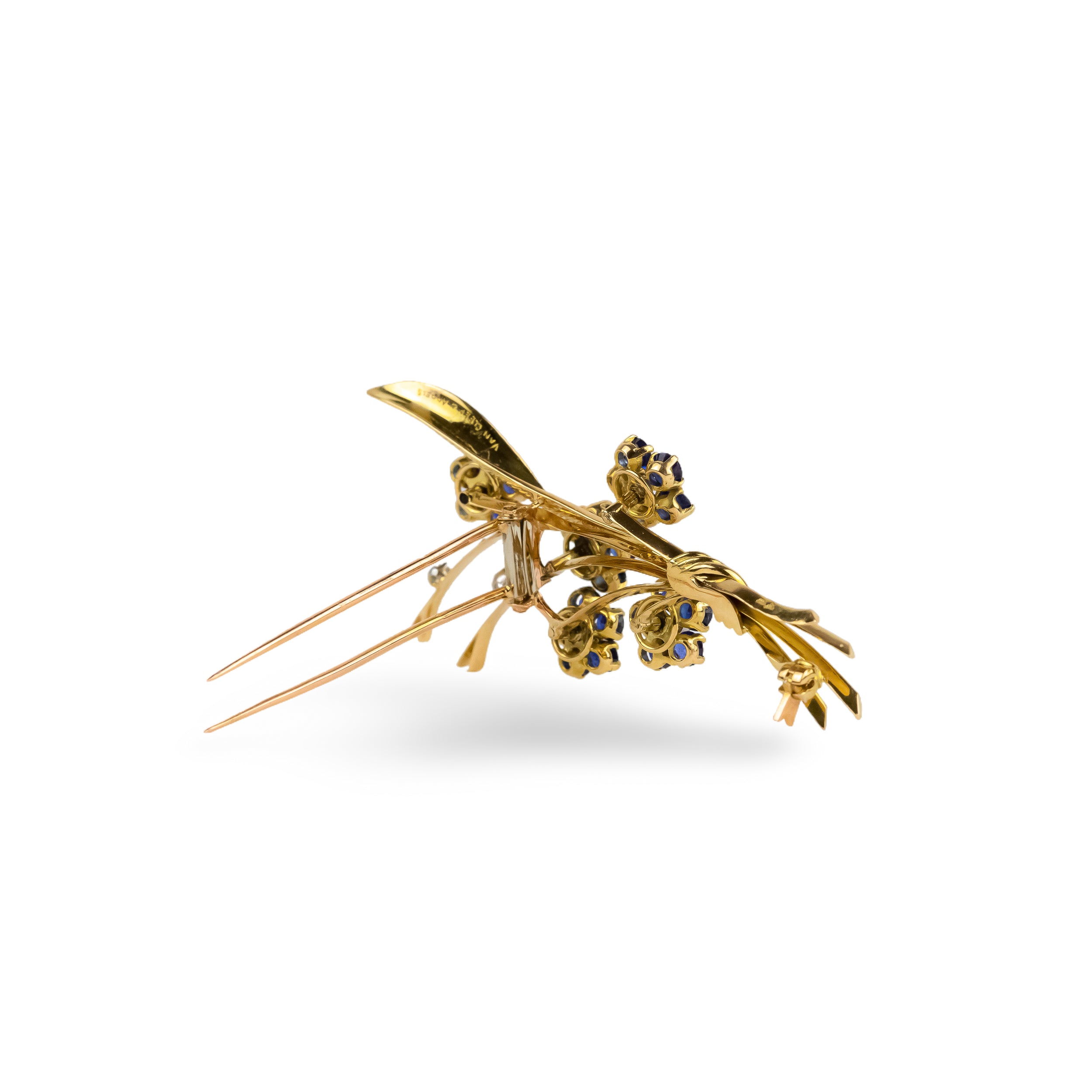 Broche Clip VAN CLEEF & ARPELS "Bouquet de fleurs" en or jaune et saphirs