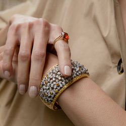 Cuff bracelet in yellow gold and diamonds 