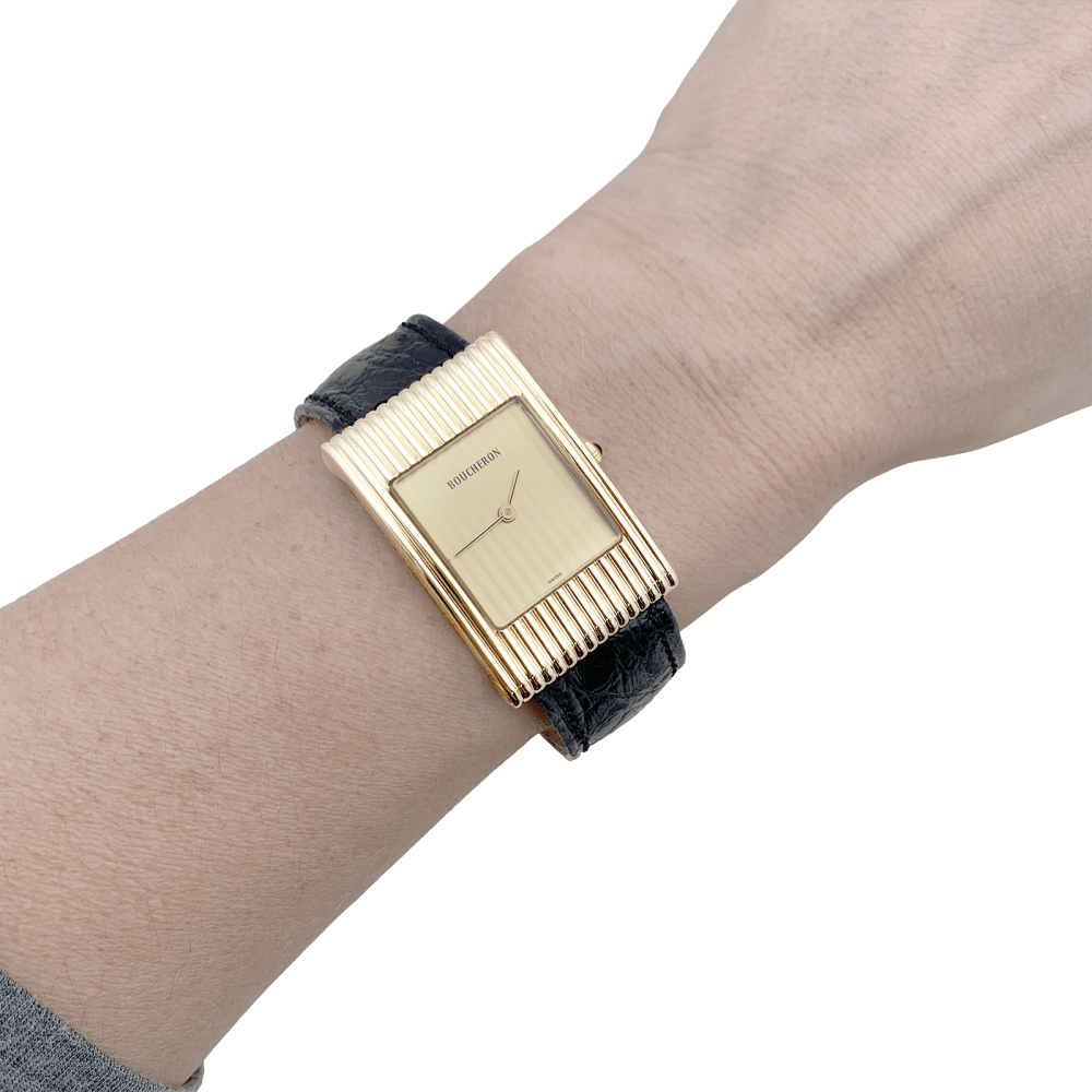Montre Boucheron, "Reflet", or jaune, cuir.
