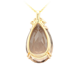 Yellow gold, quartz, and diamonds