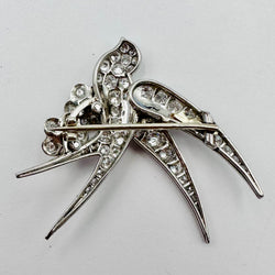 Brooch "Bird on two flowers" in white gold and Platinum