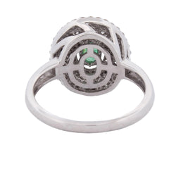 "Entourage" Ring in White Gold, Emerald, and Diamonds