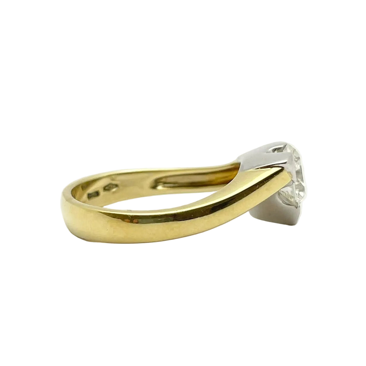 Solitaire Ring in White Gold, Yellow Gold, and Diamond