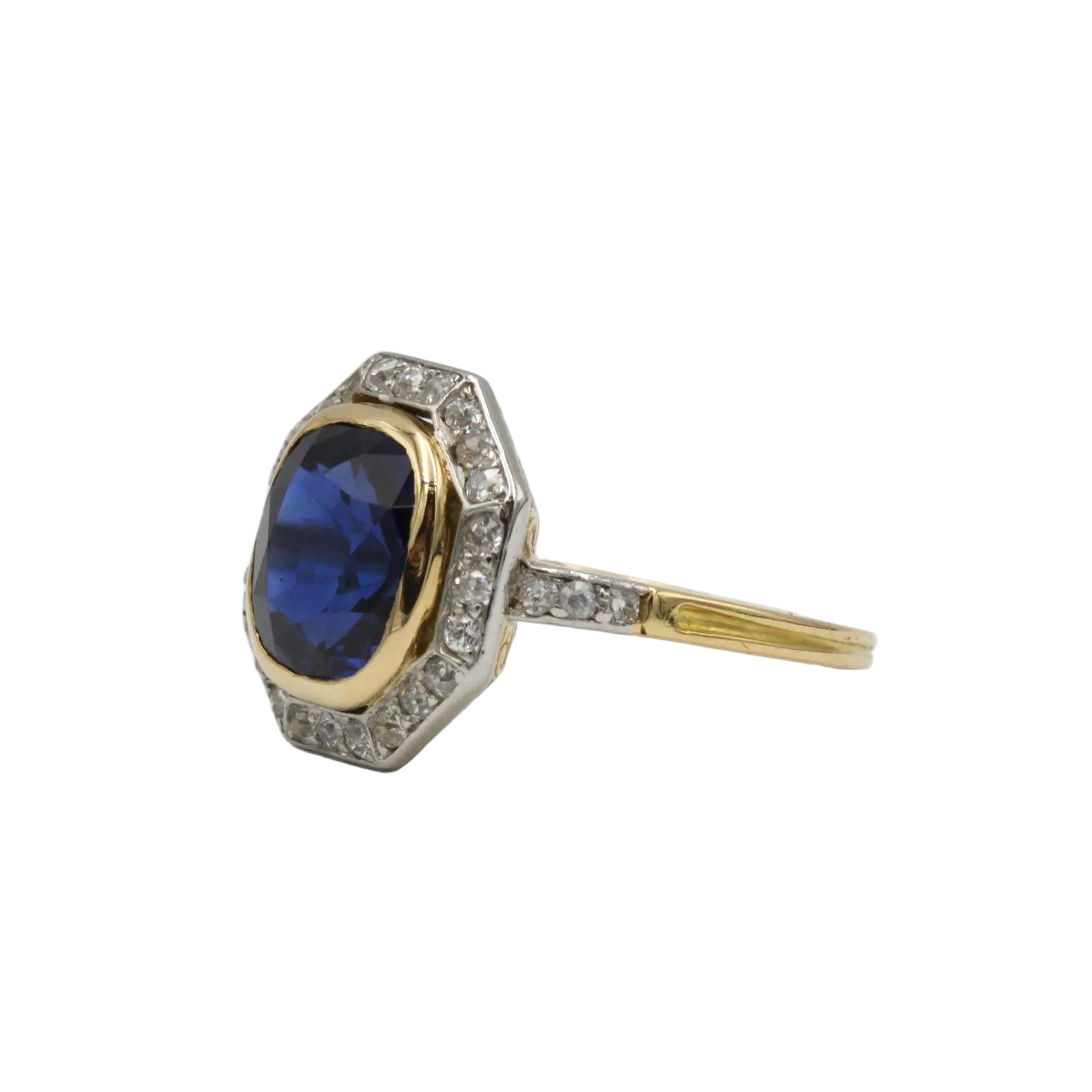 Entourage Ring in yellow gold, Platinum, Sapphire, and Diamonds