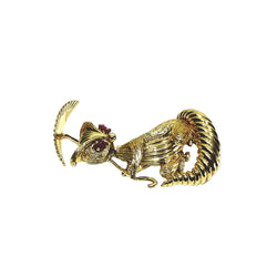 Champagne-colored gold and Ruby brooch