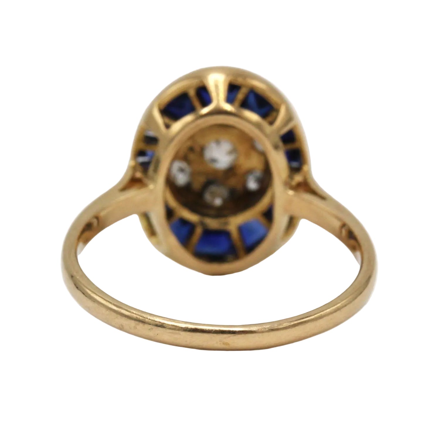 Ring in yellow gold, platinum, sapphires, and diamonds