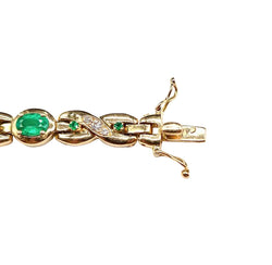 "Ligne" Bracelet in Yellow Gold, Emeralds, and Diamonds