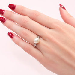 White Gold Solitaire Ring with a Pearl and Diamonds