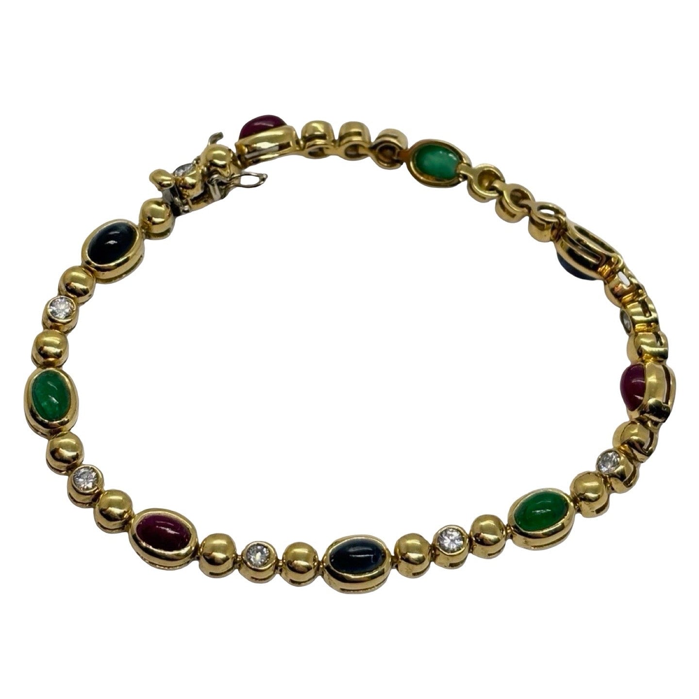 Bracelet Line in yellow gold, sapphires, emeralds, rubies and diamonds