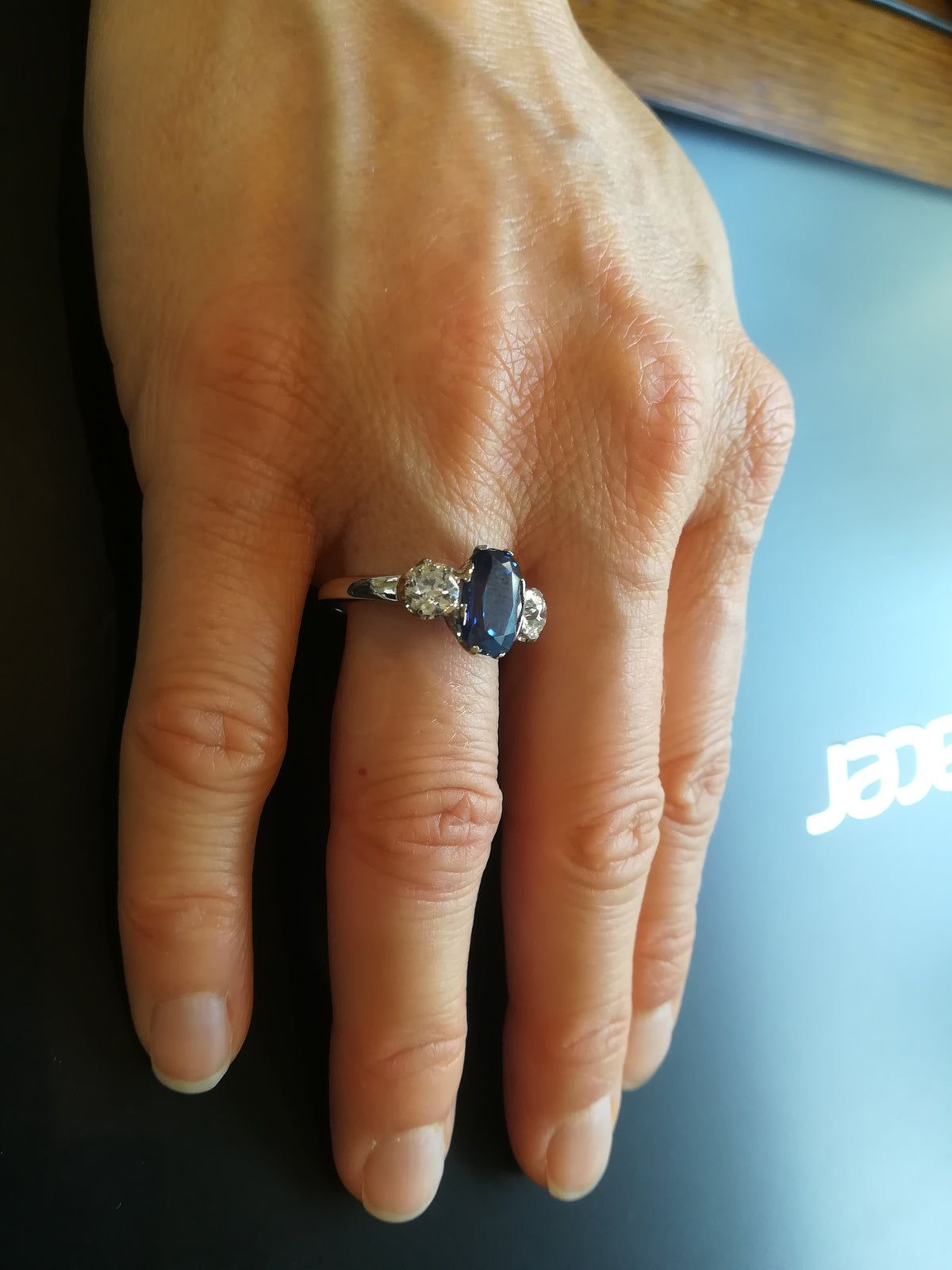 Trilogy Ring in White Gold, Sapphire, and Diamonds