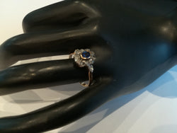 Ring in pink, paltinium, sapphire and diamonds.