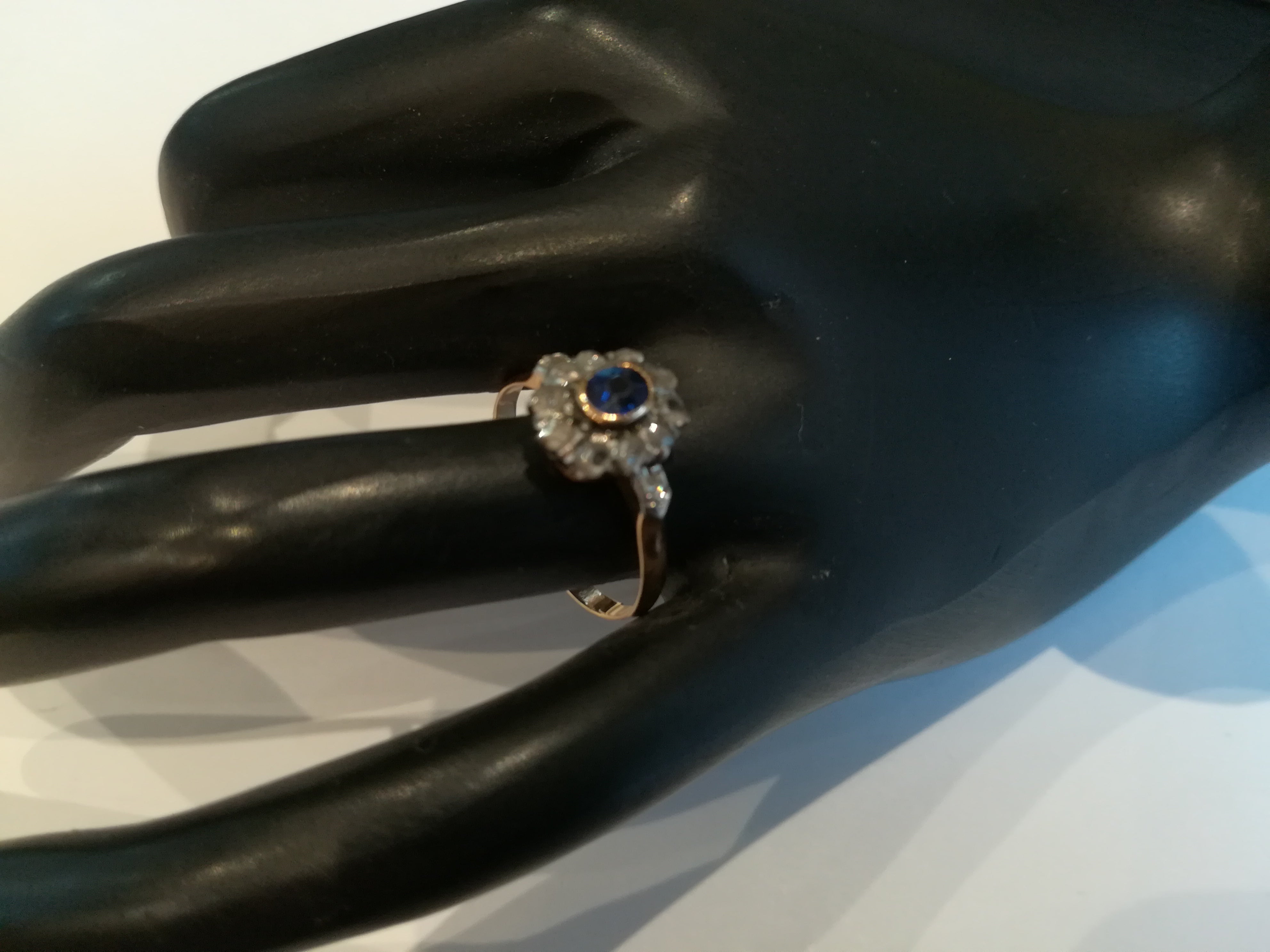 Ring in pink, paltinium, sapphire and diamonds.