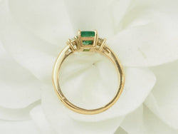 Yellow Gold Solitaire Ring with Emerald and Diamonds