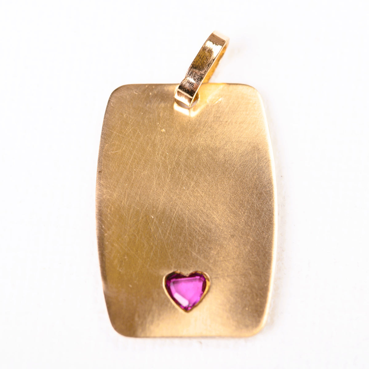 "It Beats for You" Medal in yellow gold, Enamel, and Rubies