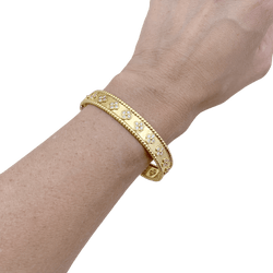 Bracelet Van Cleef & Arpels, "Perlée Trèfles", or jaune et diamants.