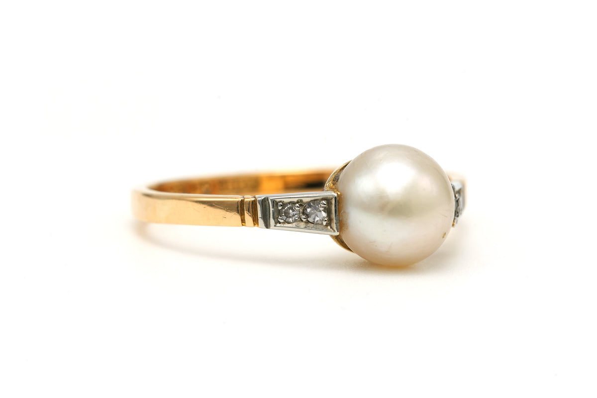 Solitaire Ring in White gold, Yellow gold, Pearl, and Diamonds
