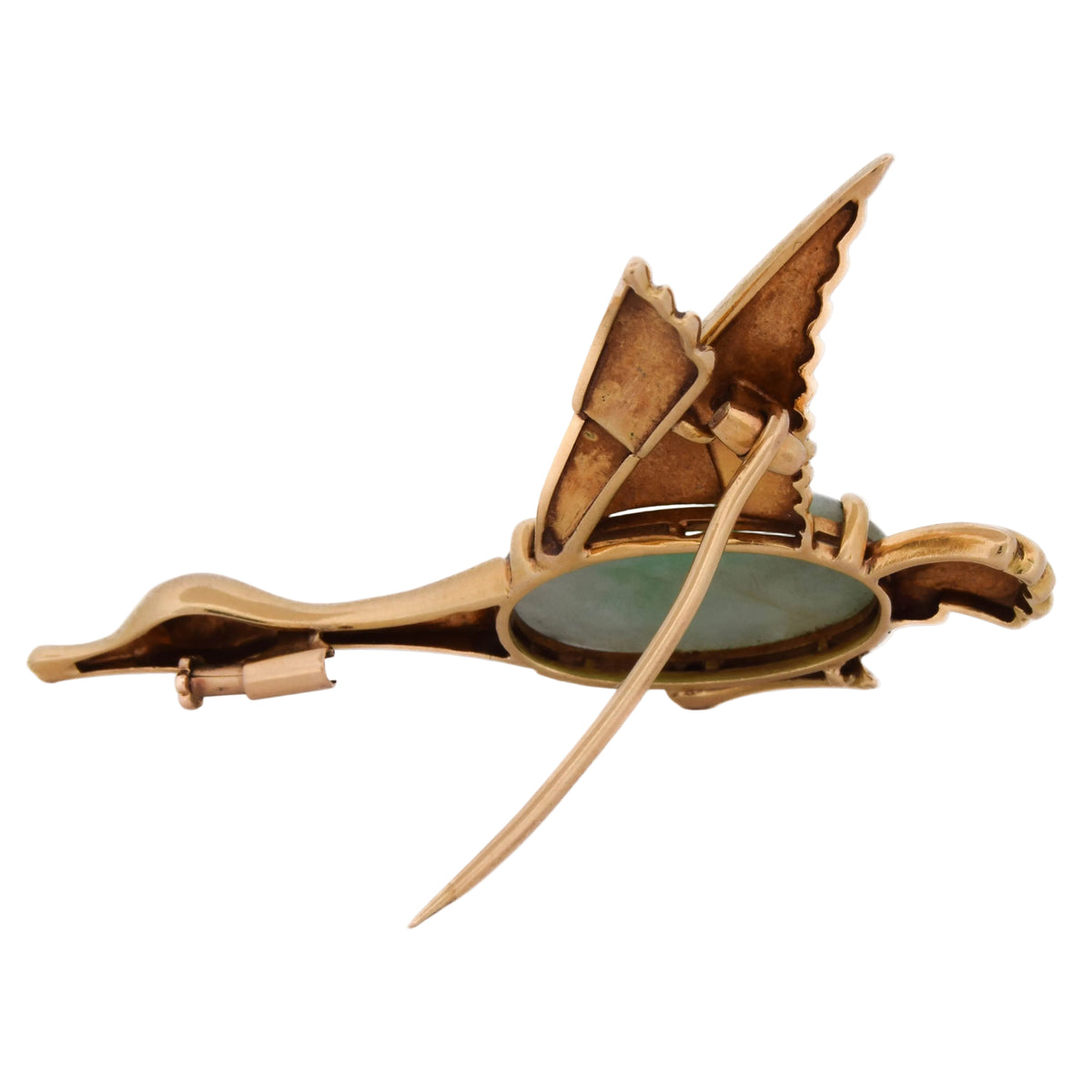 Brooch made of yellow gold, jade, and rubies