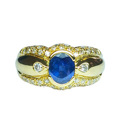 Yellow gold ring with sapphire and diamonds