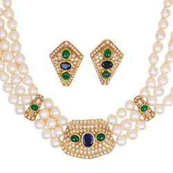 REPOSSI set in yellow gold, with pearls, sapphires, emeralds, and diamonds