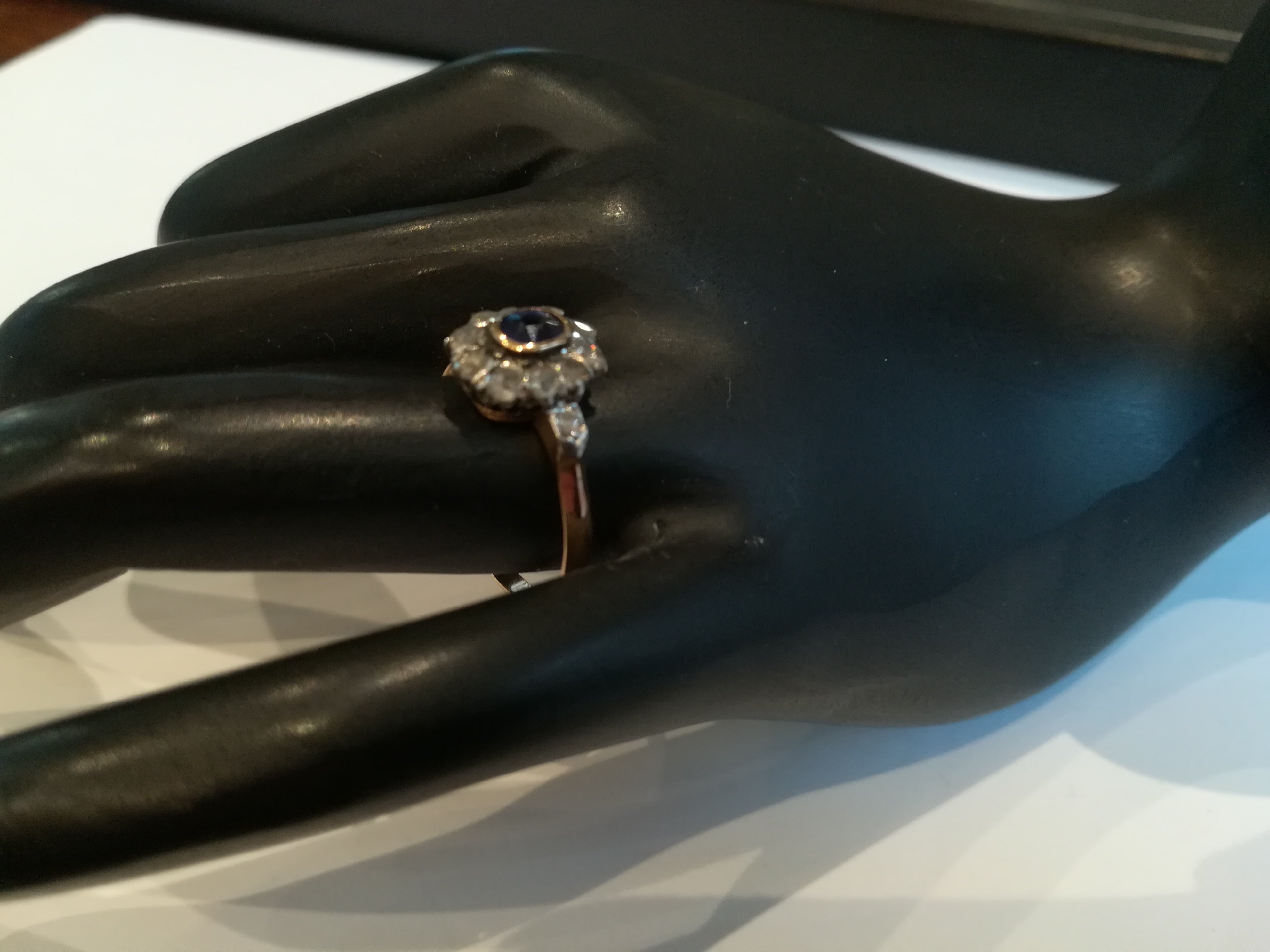 Ring in pink, paltinium, sapphire and diamonds.