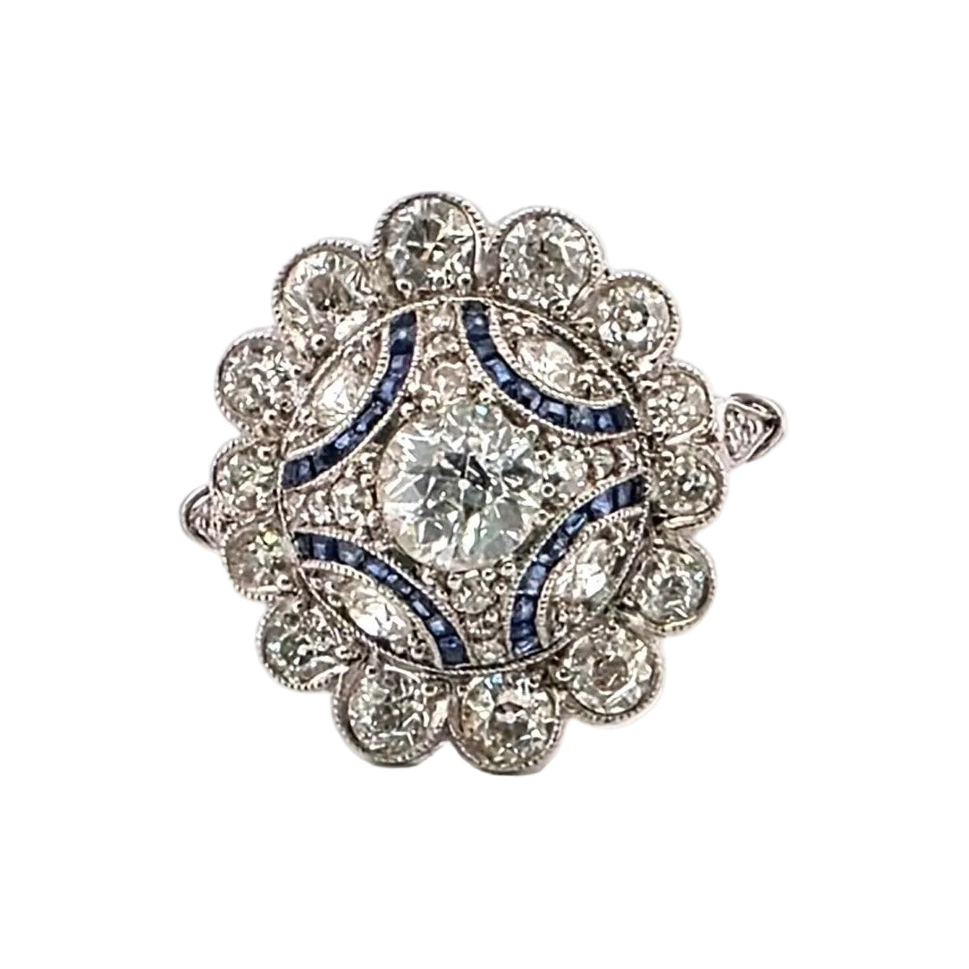 Entourage Ring in platinum, sapphires, and diamonds
