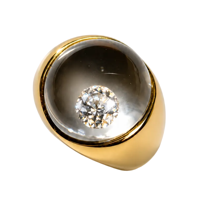 MAUBOUSSIN "Loupe" Dome Ring in yellow gold, rock crystal, and diamond