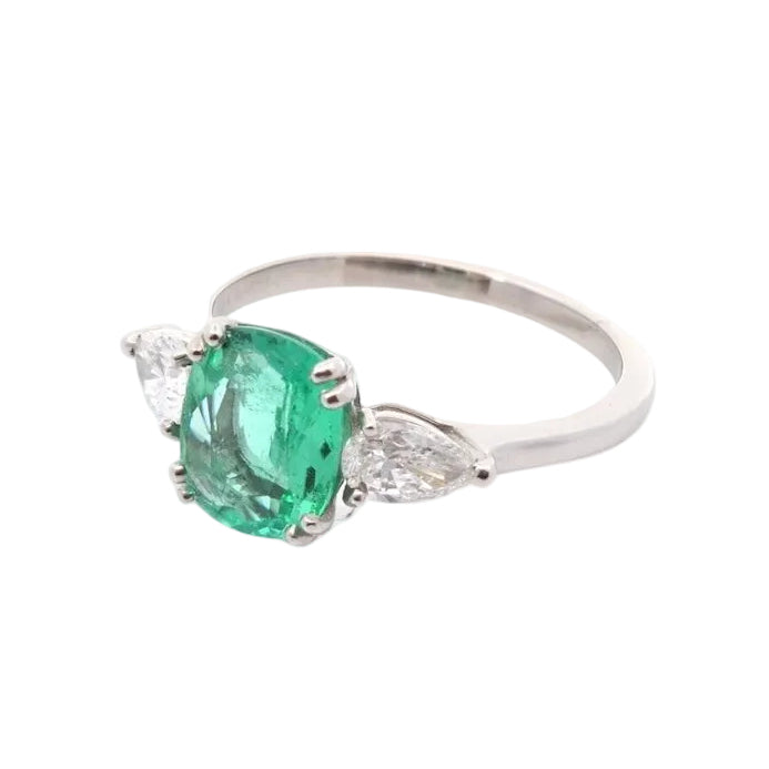 Trilogy Ring in Platinum, Emerald, and Diamonds