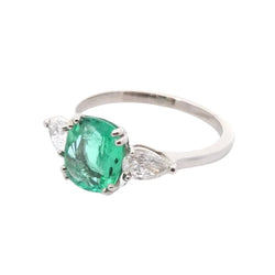 Trilogy Ring in Platinum, Emerald, and Diamonds