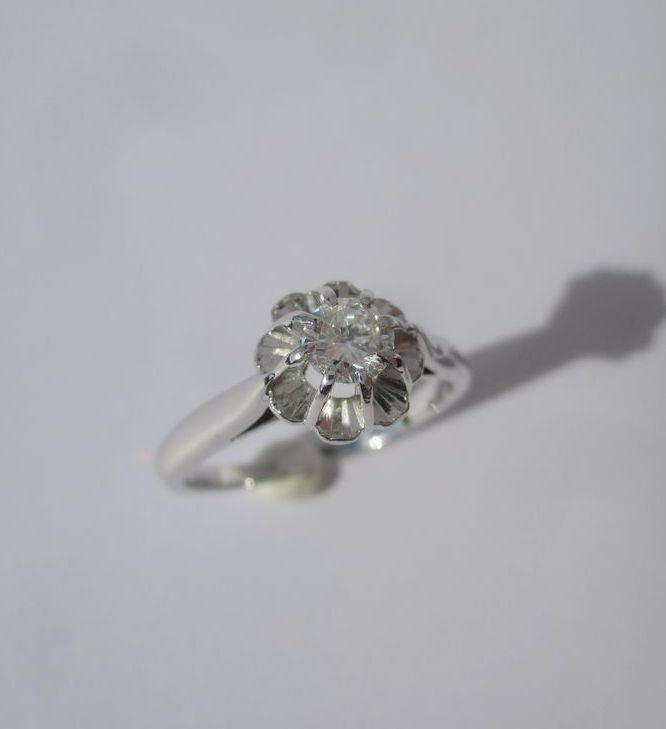 Bague Solitaire en or blanc, platine, et diamant