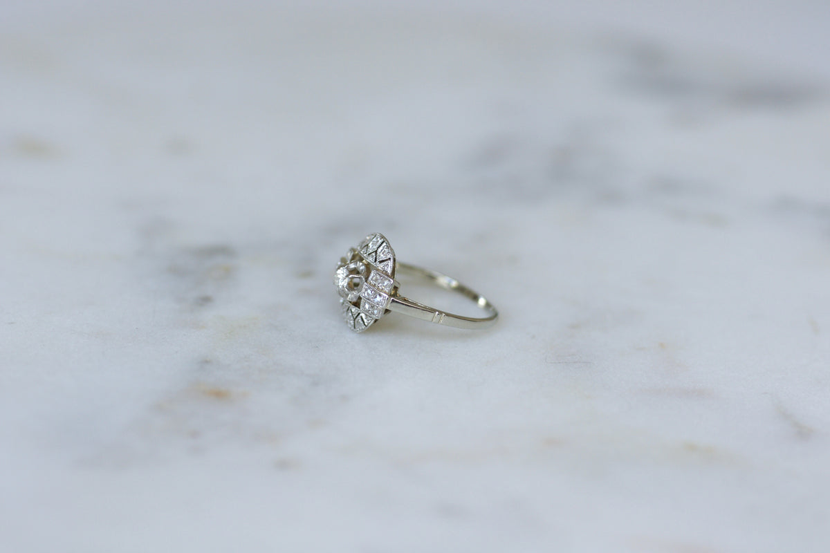 Bague Entourage en or blanc, platine et diamants